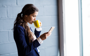 Women researching on Toil and how it works her phone