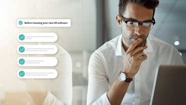 image showing man working on laptop with overlaying text saying "before choosing new hr software"