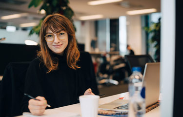 Women at work smiling