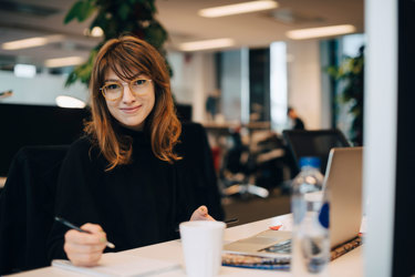 Women at work smiling