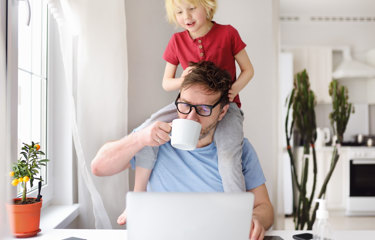parent working on laptop