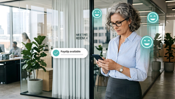 Employee checking a payslip available notification on her phone using payroll self-service software