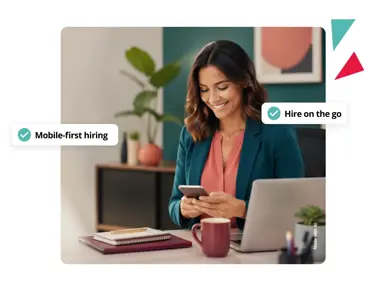 Recruiter using a mobile applicant tracking system to manage applications, review candidates and streamline recruitment workflows.