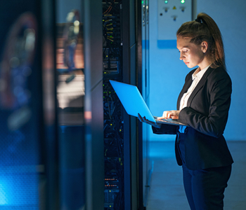 Woman checking Payroll data security on laptop