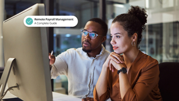 Image with 2 employees with the caption Remote Payroll Management