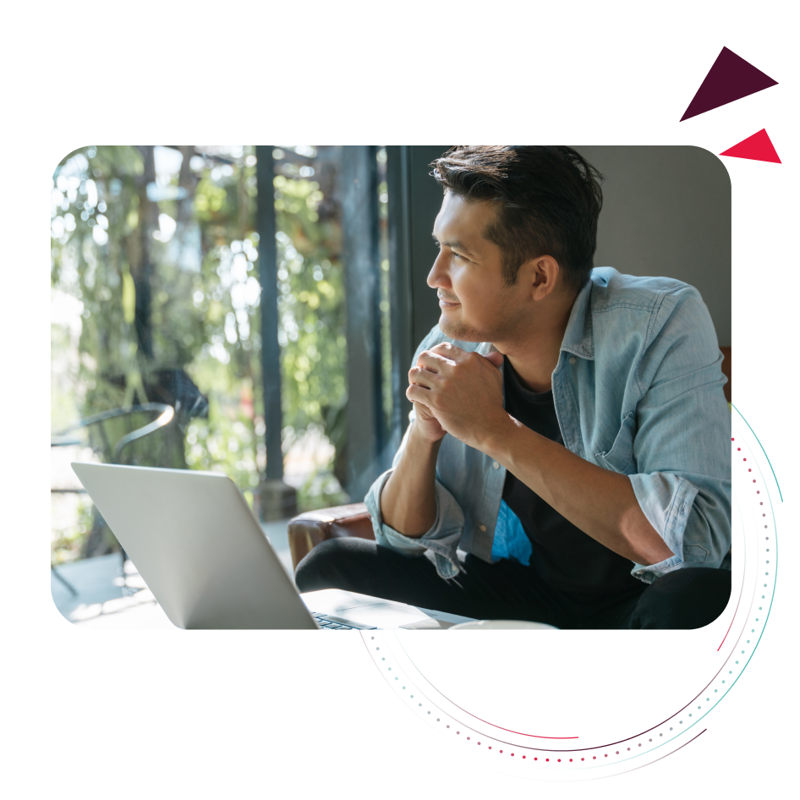 Man sitting in front of laptop managing payroll functions.