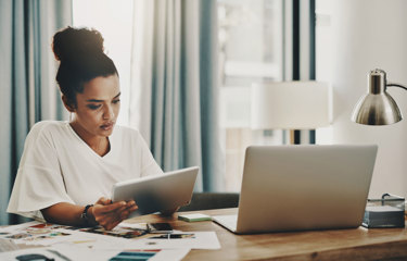 Women working from her tablet