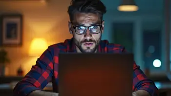 Anxious-looking man at a computer