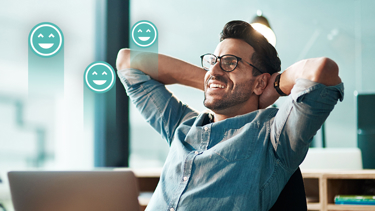 Happy man working, representing the ROI of Well being