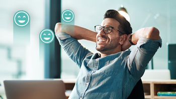 Happy man working, representing the ROI of Well being
