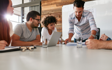 Team discussing why hr is important 